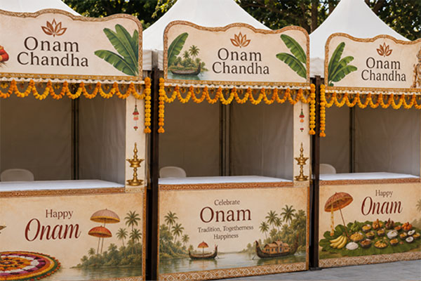 Onam Chandha traditional bazaar stalls decorated with marigold garlands